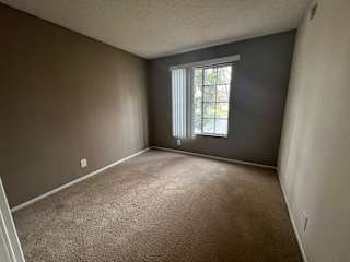 an empty room with a window in it