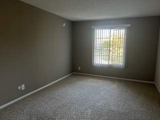 an empty room with a window in it