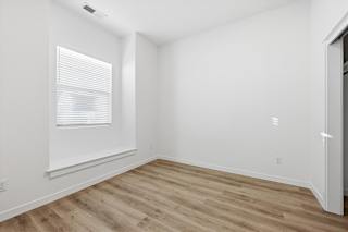 Room with hardwood floor at Alante Homes at Spring Run, Idaho
