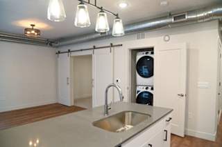 Stacked washer and dryer at The Revival Apartments, Salt Lake City