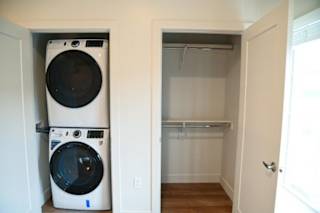Stackable washer and dryer with closet storage at The Revival Apartments, Salt Lake City, UT