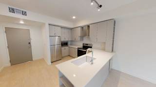 A kitchen with a white countertop and stainless steel appliances. at Paperbox Lofts Apartments, Apartments, Salt Lake City  , UT