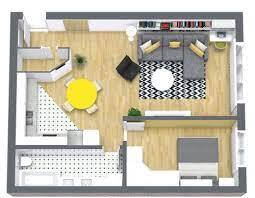 A floor plan of a house with a kitchen, living room, and dining area.