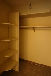 A white door with a handle and a keyhole.