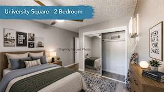 A bedroom with a bed, a dresser, and a framed picture on the wall.