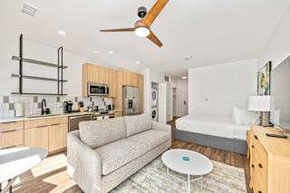 Living Room With TV at Anthem House Apartments, Huntsville, 35806