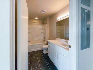 a bathroom with a toilet sink and bathtub