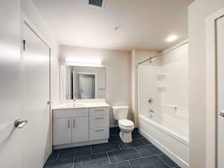 a bathroom with a toilet sink and bathtub
