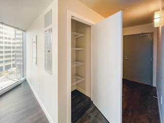 a walk in closet in a 555 waverly unit
