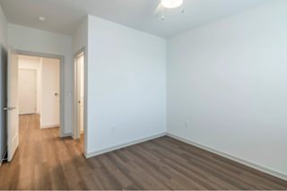A room with white walls and wood flooring.
