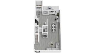 A floor plan of a small apartment with a kitchen, living room, and bathroom.