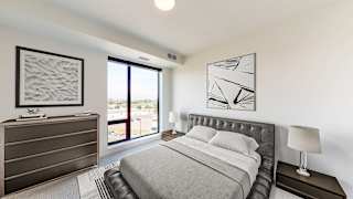 Comfortable Bedroom With Large Window at The Mason, St. Paul, MN