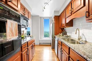 Kitchen Bar With Granite Counter Top at The Original at West Lake Quarter, Minneapolis, MN
