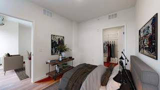a bedroom with a bed and a closet at Tyler Street Stacks, Minneapolis Minnesota