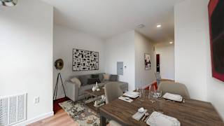 a view of the living room and dining room from the loft at Tyler Street Stacks, Minneapolis