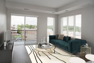 Joel 1 bedroom, living room with floor to ceiling windows and balconyat Urban Park I and II Apartments, Minnesota, 55426