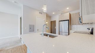 a kitchen with a large island