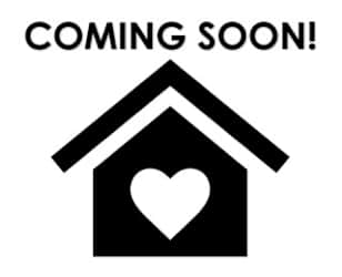 A black and white image of a house with a heart in the center and the words "COMING SOON!" above it.