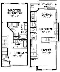 A floor plan of a house with a master bedroom, a dining area, a kitchen, and two bathrooms.
