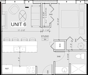 A floor plan of a unit with a living room, kitchen, and bathroom.