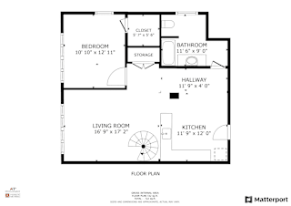 A floor plan of a house with a living room, kitchen, bathroom, bedroom and storage space.