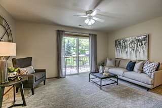 Carpeted Living Room at The Pointe, LaVista, Nebraska