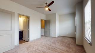 Carpeted Bedroom at The Address Galleria, Matthews