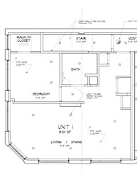 A floor plan of a unit with a living room, dining room, bedroom, bathroom, and closet.