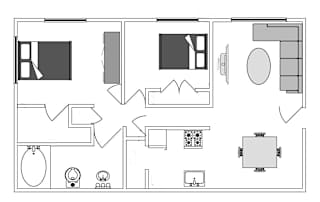 A floor plan of a house with a kitchen, living room, and bathroom.