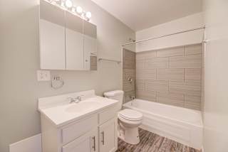Renovated Bathrooms With Quartz Counters at Johnson Legacy Apartments, Milwaukee, 53223