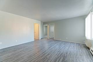 Contemporary Finishes Include Wood And Tile Flooring at Johnson Legacy Apartments, Milwaukee