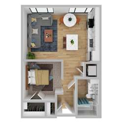 A top-down view of a living room with a grey couch, a coffee table, and a television.