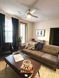 a living room with a couch and a coffee table