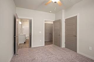 Wooden flooring bedroom at The Augustan, Augusta, GA