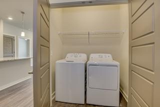 Washer/dryer set in laundry closet at The Augustan, Georgia