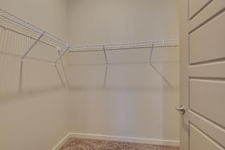 Large closet with wire shelving at The Augustan, Augusta