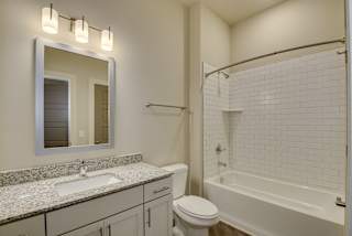 Bathroom with shower/tub combo at The Augustan, Georgia, 30901