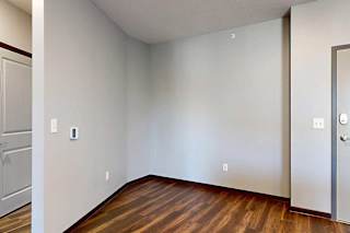 A cozy nook between the front door and the hallway, great for an at home office.