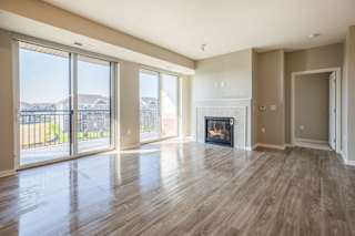 Fireplace in premium design scheme at Ascend at Woodbury new luxury apartments in Woodbury MN 55129