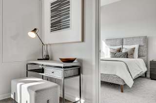 Doorway of furnished bedroom at Aspire at CityPlace in Woodbury MN 55125