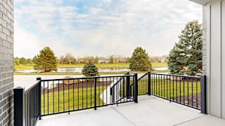the view from the walk-out patio of the pond to the east