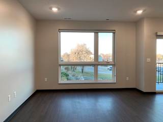 dining area with large floor to ceiling window