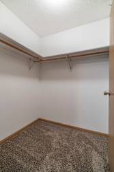 walk in closet with shelving