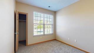 a room with arrows on the wall and windows