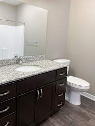 Small bedroom in the Plum studio apartment at the flats at shadow creek