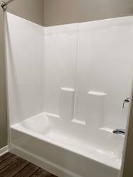 Shower and tub combo in the plum studio floorplan