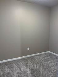 Small bedroom in the Plum studio apartment at the flats at shadow creek