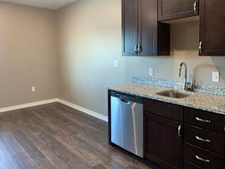 Kitchen space leading to the living and dining space