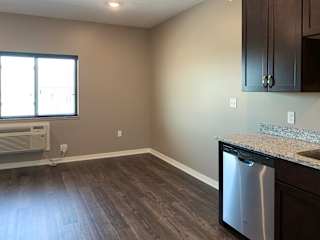 Kitchen space leading to the living and dining space