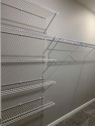 Walk in closet with ample shelving and hanging space in the buffalo floorplan